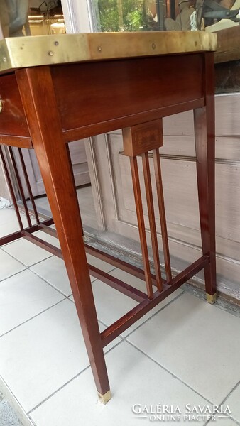 Table with drawers with copper decoration