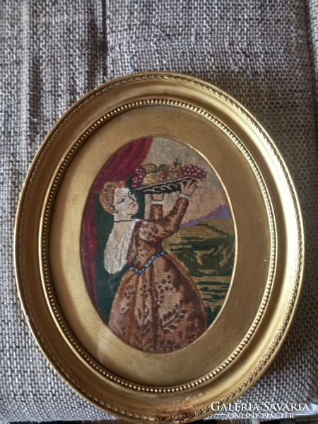 In a larger tapestry frame