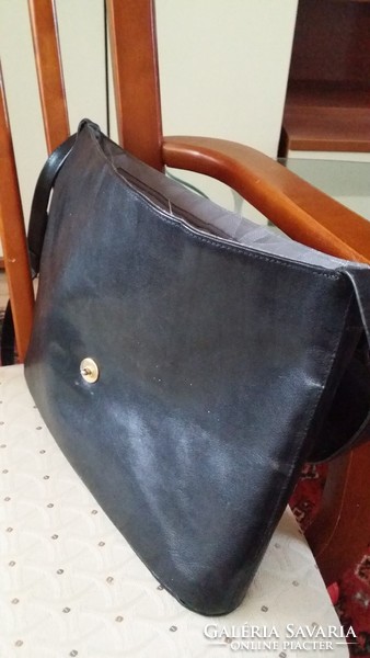 Beautiful occasion leather bag, size A4, in new condition