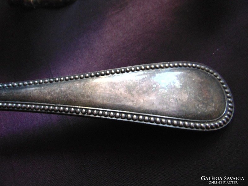 Large old v. Antique silver-plated ladle