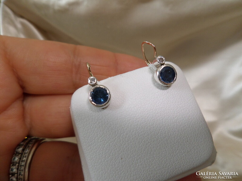 Antique gold buton earrings with a pair of blue sapphires and brils