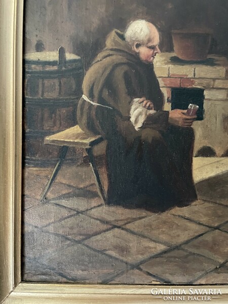 A monk drinking wine from a flame lipot