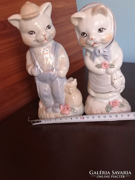 A pair of large charming cats