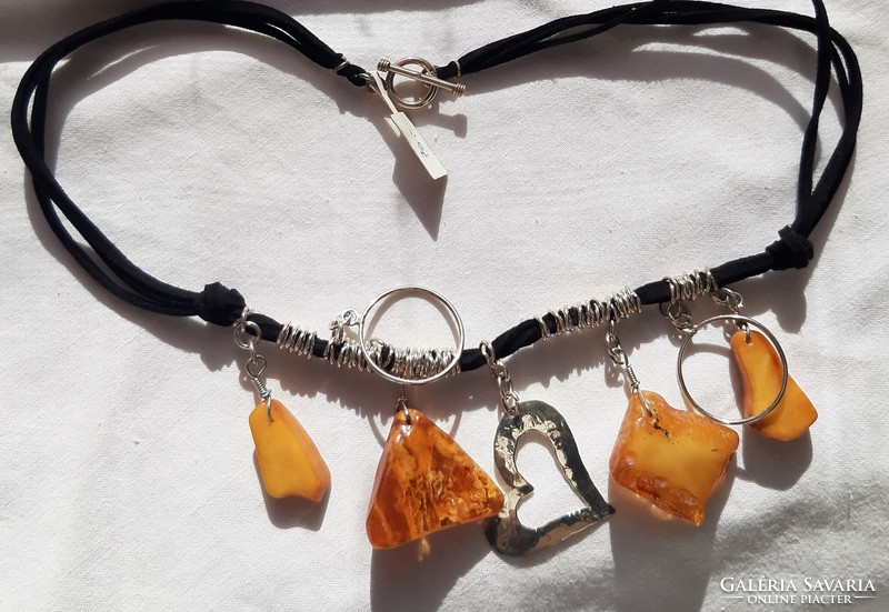 Berskin necklace with amber stone and silver charms!