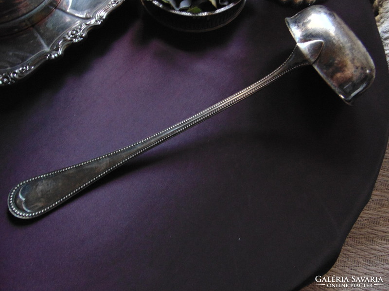 Large old v. Antique silver-plated ladle