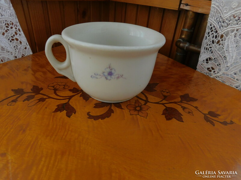 Old coma cup with floral pattern, perfect