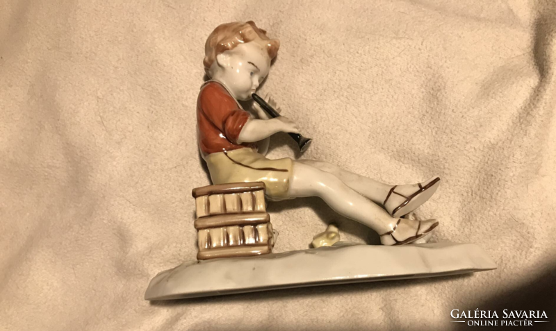 German flute playing boy with chicks, porcelain