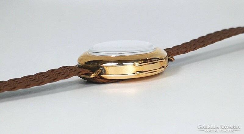 14 K gold case women's watch from the 1920s! With Tiktakwatch service card, warranty!