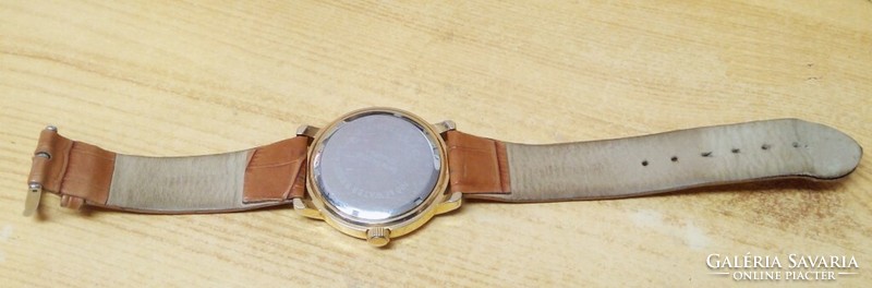 Gold-plated bicolor men's wristwatch, in good condition, leather strap, Japanese quartz movement
