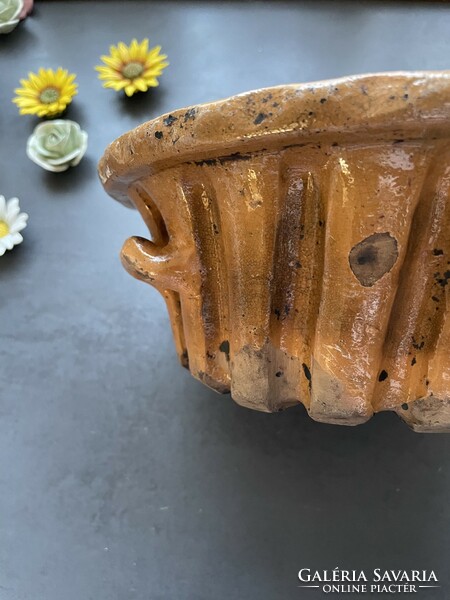 A very old folk potter's ceramic kuglóf oven, ideal for ovens