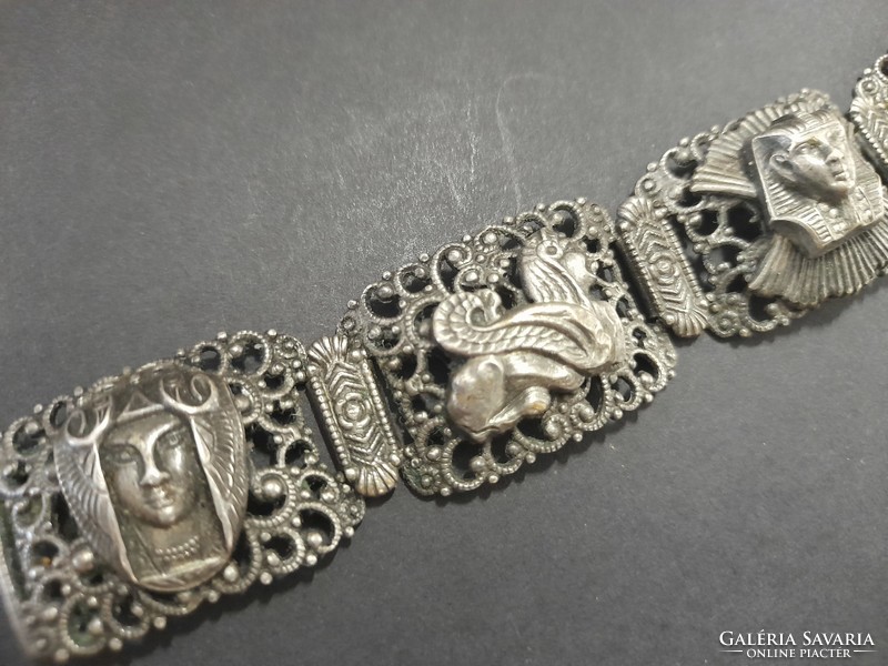 Silver-plated Egyptian pattern bracelet.