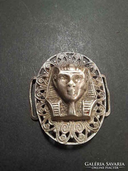 Silver 925 ribbon pendant with Egyptian pattern. 1.3 Grams.