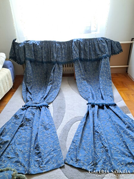 A new set of 2 pairs of blackout curtains with a baroque pattern matching the castle