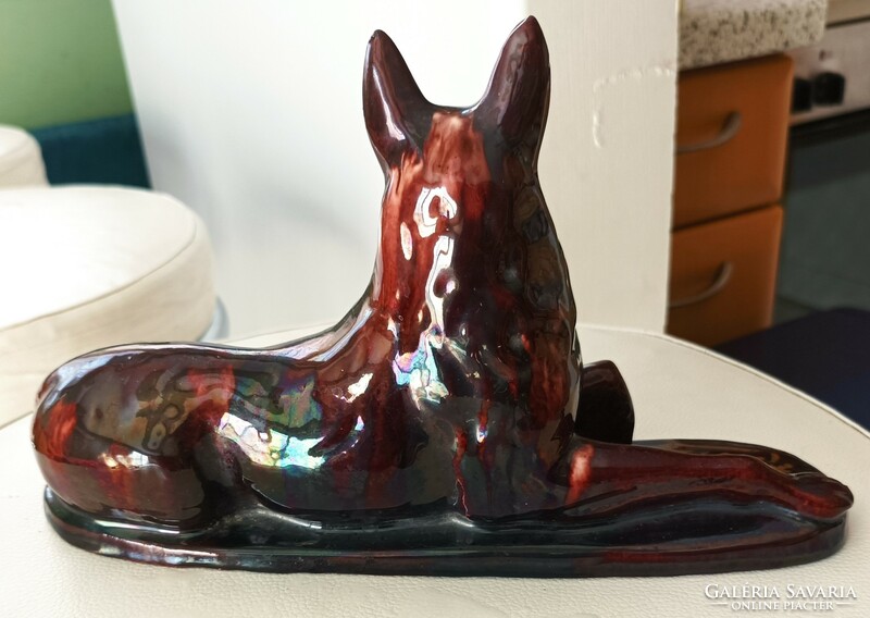 Porcelain dog statue.