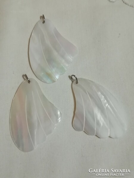 Angel wing pendants from shells.