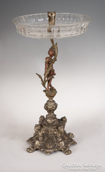 Neo-baroque centerpiece decorated with plastic figures