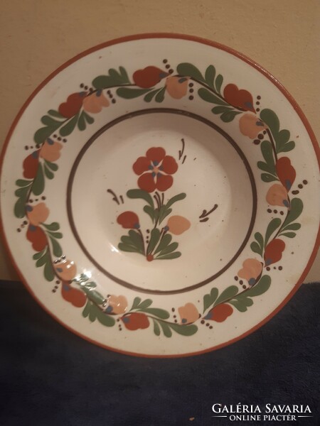 Old ceramic painted wall plate