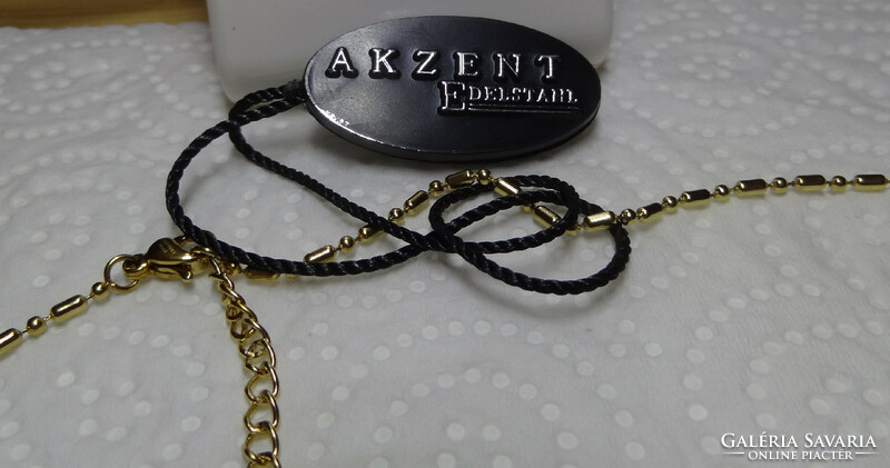 Quality brand, accent medical steel on the chain marked and pendant.