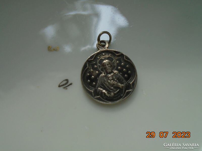 Silver patina religious pendant of the Virgin of Lourdes and the Sacred Heart of Jesus