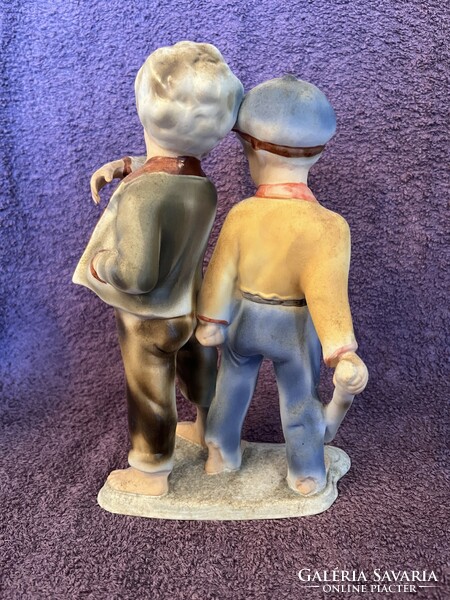 Quarrelsome boys matte porcelain figure