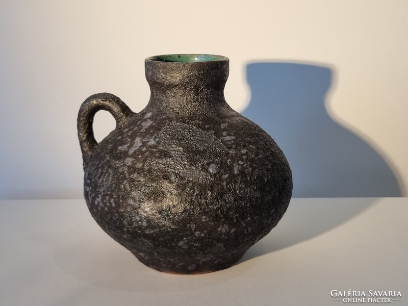 Old vase with a special lava-like blister glaze