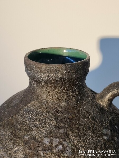 Old vase with a special lava-like blister glaze