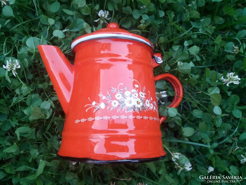 Old, enamelled, red jug