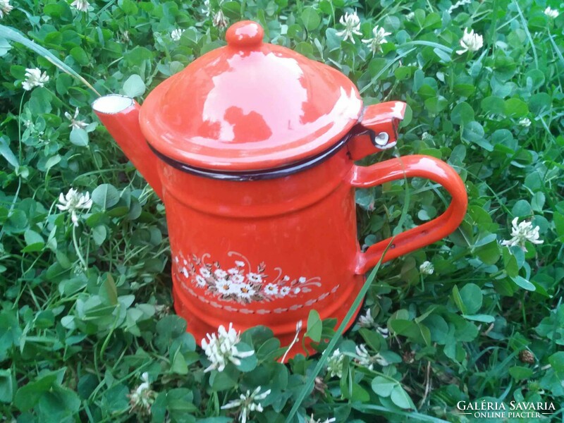 Old, enamelled, red jug