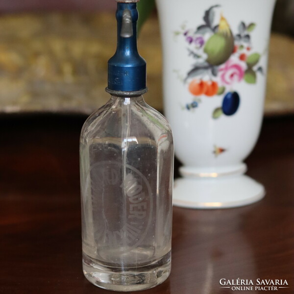 Small blue vintage soda bottle