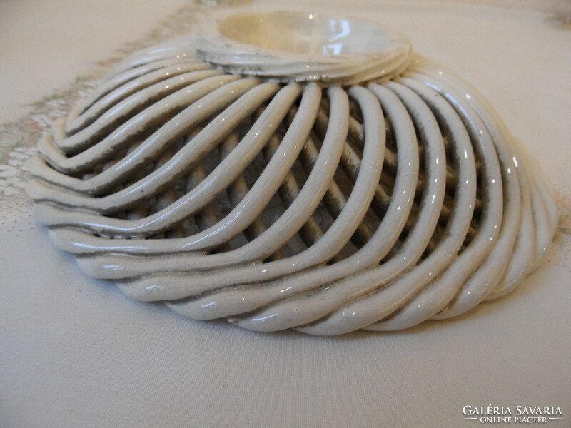 Older porcelain bowl with openwork edges, offering