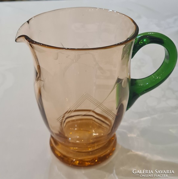 Old, engraved, broken glass jug, multicolored