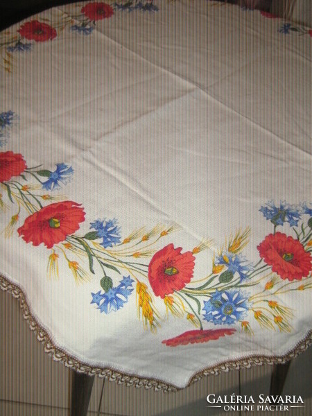 Charming vintage-style tablecloth with summer flowers and poppies