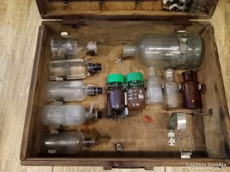 Old mobile laboratory in a wooden suitcase