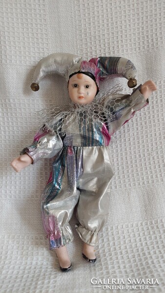 A clown figure with a rattle