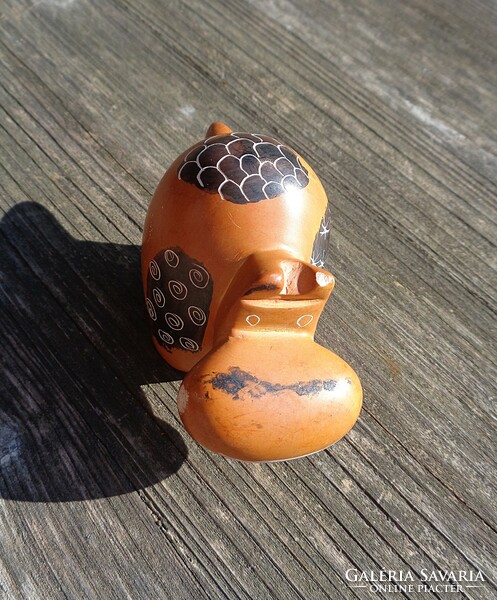 Carved and painted soapstone figurine