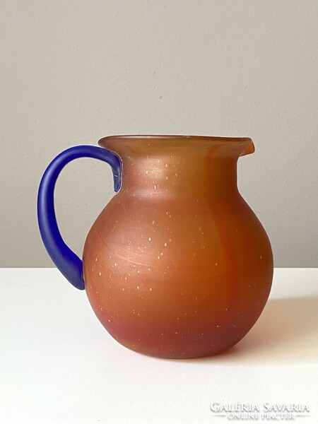 Czech retro glass jug with orange body and blue handle