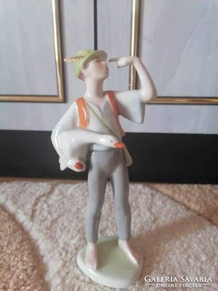 Hand-painted drasche porcelain figurine of Matyi with a goose