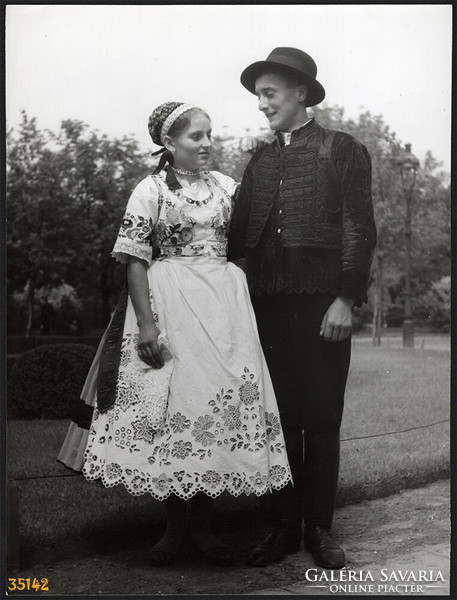 Larger size, photo art work by István Szendrő. Young couple in traditional swimming costume, swimming pool, uncle-