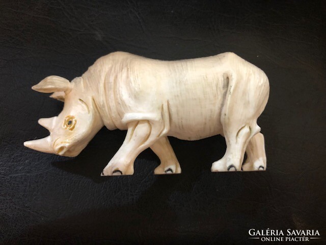 Rhinoceros representation, made of African bone, size 10 x 5 cm, antique, before 1920