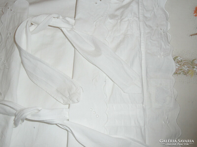 Older white cotton swaddle cover