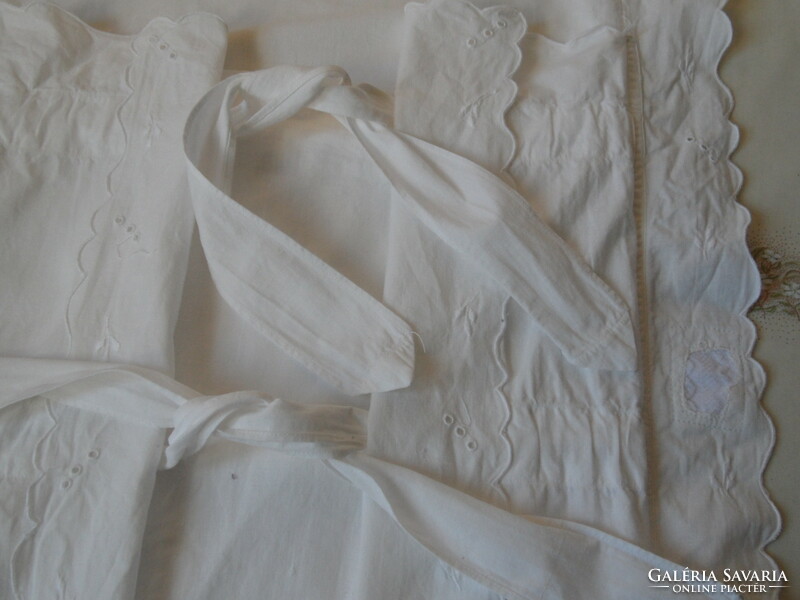 Older white cotton swaddle cover