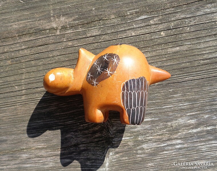 Carved and painted soapstone figurine
