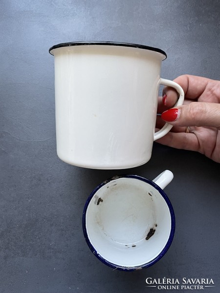 Pair of old white enamel mugs