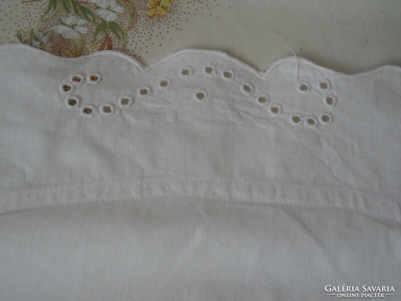 Older white cotton swaddle cover