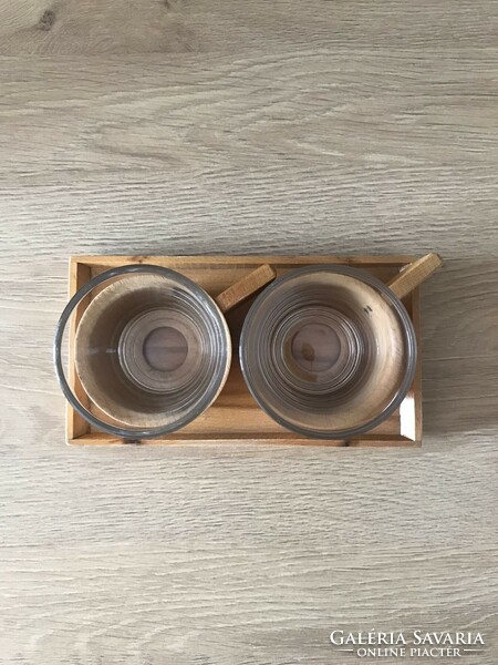 2 glass cups with wooden coasters