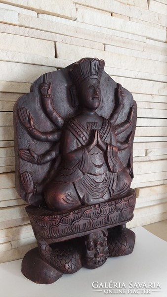 Buddha, old carved wooden statue