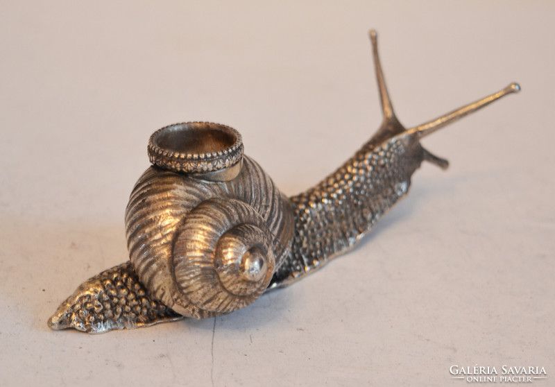 Silver snail-shaped candle holder