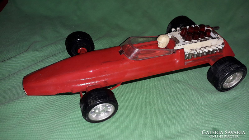 Old vinyl - metal sheet bottom flywheel shape - 1 toy car 28 cm tall as shown in the pictures