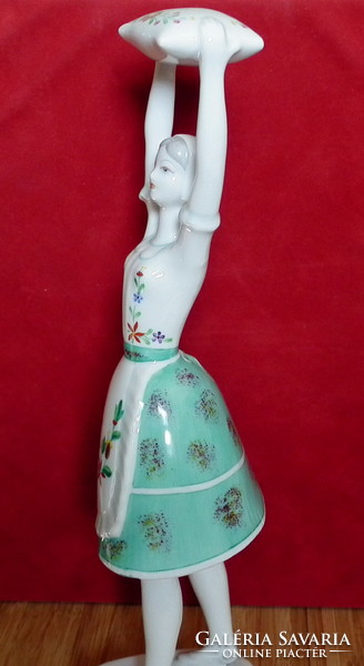 Hollóháza porcelain - woman lifting a pillow, in folk costume 29cm