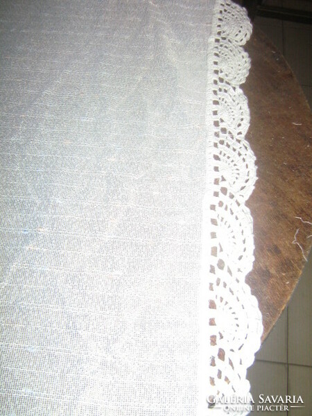 A pair of fabulous vintage-style huge curtains with special hand-crocheted lace edges